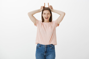 Girl showing her stubbornness and character. Portrait of flirty and sensual good-looking woman in...