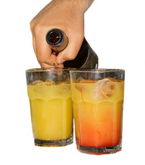 Barmen making tequila sunrise
