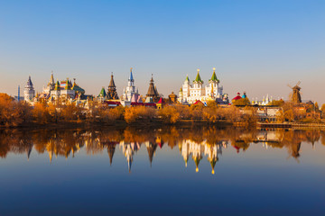 View of the Izmailovo kremlin and the silver-Grape pond in the golden autumn. Moscow, Russia