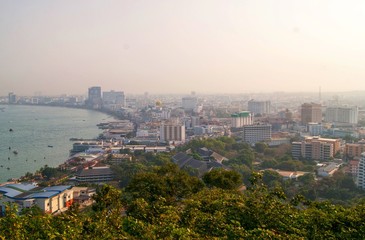 The building and skyscrapers in twilight time in Pattaya,Thailand. Pattaya city is famous about sea sport and night life entertainment.