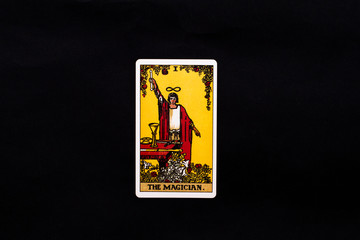An individual major arcana tarot card isolated on black background. The Magician.
