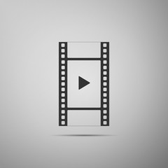 Play Video icon isolated on grey background. Film strip with play sign. Flat design. Vector Illustration