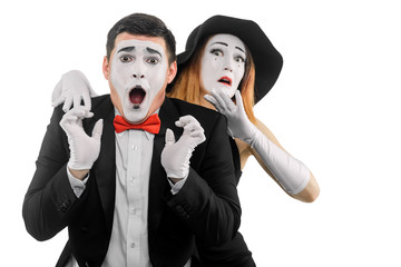 Two frightened mime actors