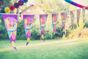 Birthday party decoration. Colorful party flags with birthday cake, balloons and text party time,...