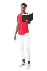 Full body of Young african american man holding a book and giving it to someone on white background