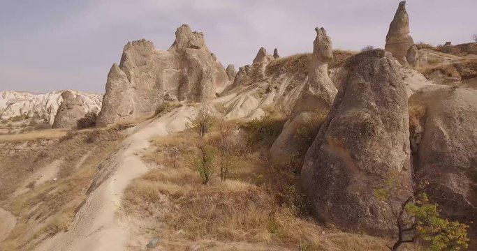 Amazing and unusual rocks of the Cappadocia. Impressive valleys: Love, Zemi, Rose, Kidar. Natural stone pillars of various shapes.
