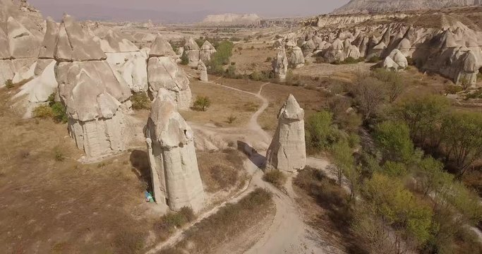 Amazing and unusual rocks of the Cappadocia. Impressive valleys: Love, Zemi, Rose, Kidar. Natural stone pillars of various shapes.