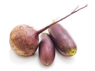 Two blue eggplant and one red beet.
