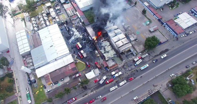 Aerial view of a fire that destroy a liquor factory.