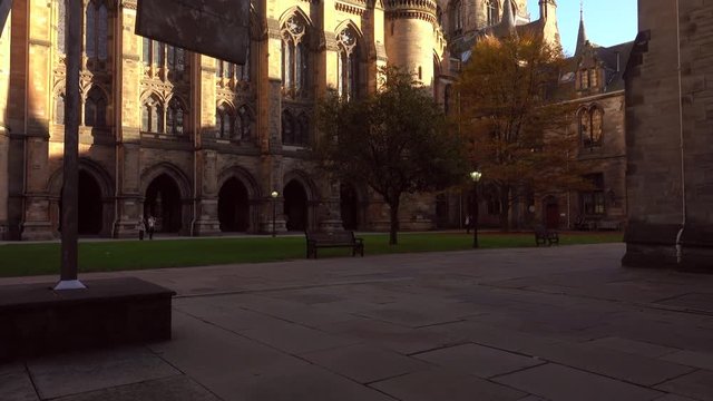 Tilt up from within a quadrangle of Glasgow University to reveal the Tower.