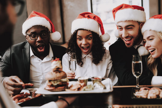 Burger. Santa's Hat. Girls and Guys. Young People.
