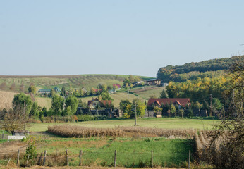 Traditional European buildings in the autumn hills