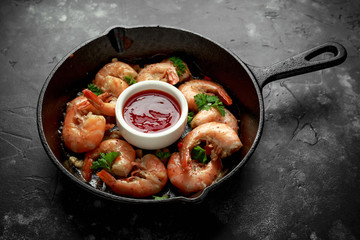 Fried in garlic butter shrimps served with sweet chili suace and parsley