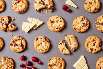 Fresh chocolate chip cookies pattern on grey background
