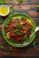 Lentil salad with roasted red pepper, zucchini and dry tomatoes, lemon. healthy food, vegetarian and vegan style
