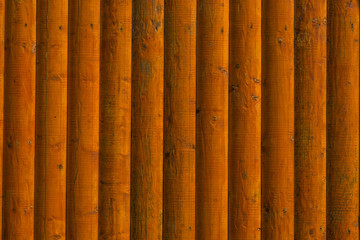 wall of wooden lacquered vertical boards background