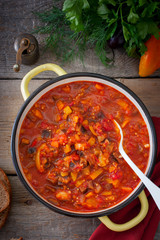 Vegetable gyuvech, a traditional dish for Moldovan, Romanian, Bulgarian cuisine, top view, selective focus