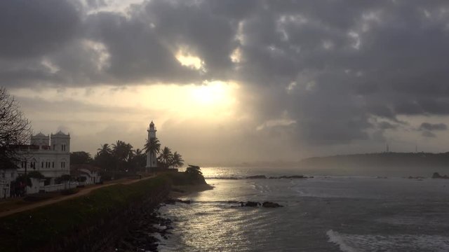Galle fort and lighthouse at sunset in Galle, Sri Lanka