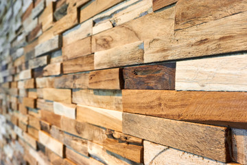 Pattern in perspective of different rectangular wooden blocks on a wall as a wall decoration