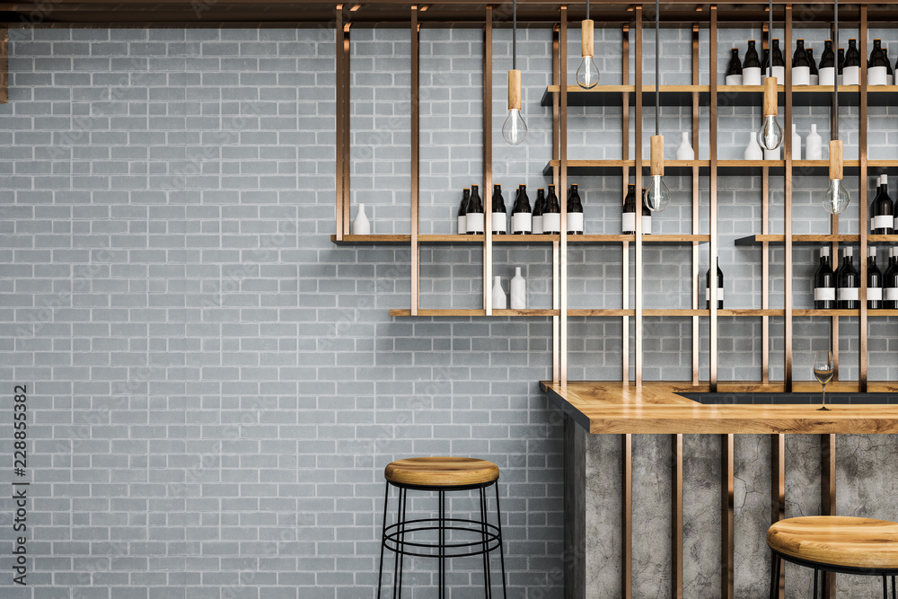 Wall mural gray brick bar table with stools, copy space