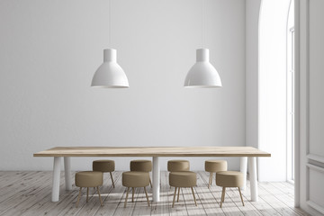 White dining room interior, long table