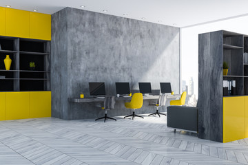 Gray and yellow startup office interior