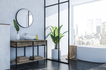 White bathroom corner, white tub and sink