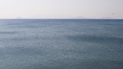 Fototapeta premium Quiet Waves On Vast Sea Horizon.