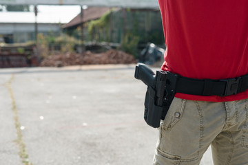 Close Up on Gun in Holster