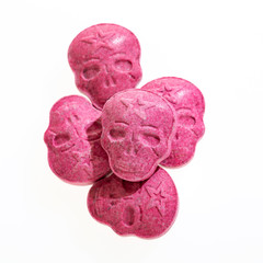 Red Army Skull, Ecstasy, XTC pills isolated on a white background.