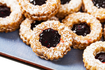 Raspberry Jam Filled Shortbread Butter Cookies. Selective focus.
