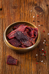 Delicious Homemade Beef Jerky Background. Selective focus.