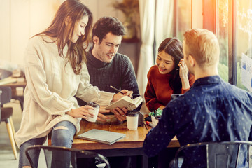 mix asian woman caucasian men People Meeting Friendship Togetherness and happiness enjoy at Coffee Shop Concept casual relax moment