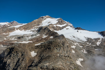 Fototapeta na wymiar View to Vincent Pyramid mount and Bors glacier in Monte Rosa massif near Punta Indren. Alagna Valsesia area, Italy