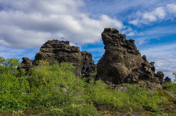 Fototapeta na wymiar Dimmuborgir - a rock town near the Lake Myvatn in northern Iceland with volcanic caves, lava fields and rock formations