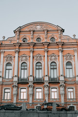 Elements of architecture of historical buildings. The streets of St. Petersburg with its bridges and rivers. Night view of the city at sunset.
