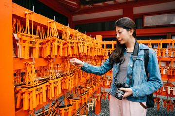 female traveler standing at the praying wall