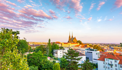 Brno, Czech republic: Sunset over the St Peter and Paul cathedral (Petrov in local speak). Historical and ancient religion building in center of Brno city, South Moravia region - obrazy, fototapety, plakaty