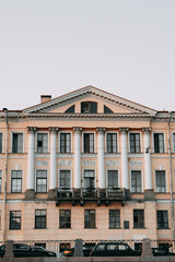 Fototapeta na wymiar Elements of architecture of historical buildings. The streets of St. Petersburg with its bridges and rivers. Night view of the city at sunset.