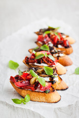 Sun dried tomatoes, cream cheese and fried mushrooms bruschetta