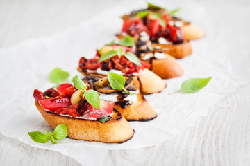Sun dried tomatoes, cream cheese and fried mushrooms bruschetta