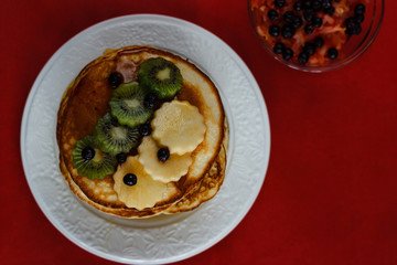 pancakes with fruits and honey