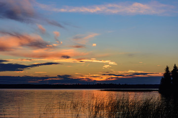 Fototapeta na wymiar sunset reflection on lake