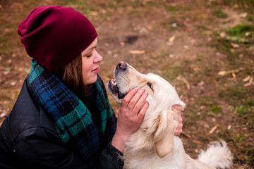 girl on the street with her beloved dog