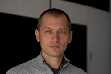 Close Up Portrait Of Man Standing on the room