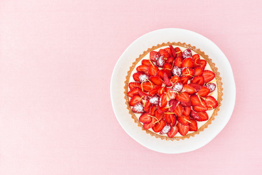 Strawberry Tart with Cake Plate and Pink Background