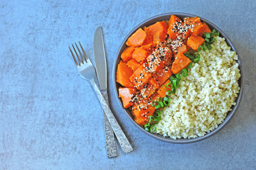 Vegan bowl with bulgur and pumpkin. Healthy tasty food. The concept of proper nutrition.