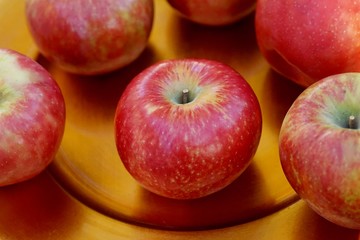 Fototapeta na wymiar Red Apples in Gold