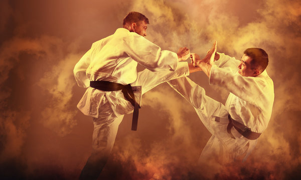 Martial arts masters. Smoke background