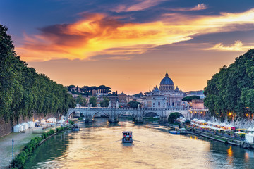 View on the Vatican in Rome, Italy, at sunset with dramatic sky. Scenic travel background.